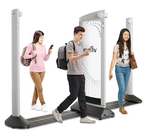 Students walking through Evolve detector